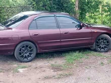 Красный Мицубиси Галант, объемом двигателя 2 л и пробегом 275 тыс. км за 2200 $, фото 1 на Automoto.ua