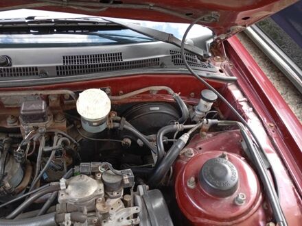 Красный Мицубиси Галант, объемом двигателя 2 л и пробегом 280 тыс. км за 2500 $, фото 1 на Automoto.ua