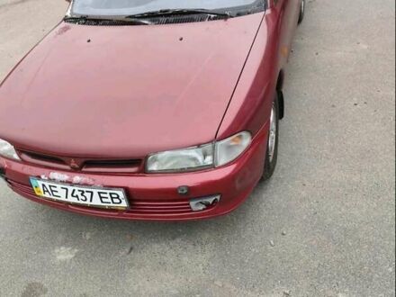 Красный Мицубиси Галант, объемом двигателя 1.6 л и пробегом 233 тыс. км за 2000 $, фото 1 на Automoto.ua