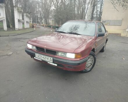 Красный Мицубиси Галант, объемом двигателя 2 л и пробегом 666 тыс. км за 999 $, фото 1 на Automoto.ua