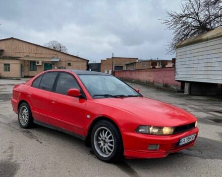 Красный Мицубиси Галант, объемом двигателя 2.5 л и пробегом 300 тыс. км за 1850 $, фото 1 на Automoto.ua