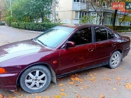 Красный Мицубиси Галант, объемом двигателя 2 л и пробегом 190 тыс. км за 2500 $, фото 1 на Automoto.ua