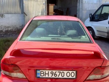 Красный Мицубиси Галант, объемом двигателя 2.5 л и пробегом 300 тыс. км за 3500 $, фото 1 на Automoto.ua