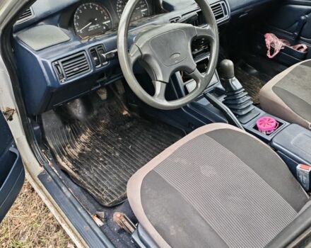 Серый Мицубиси Галант, объемом двигателя 1.8 л и пробегом 300 тыс. км за 450 $, фото 1 на Automoto.ua