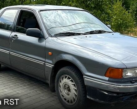 Сірий Міцубісі Галант, об'ємом двигуна 2 л та пробігом 250 тис. км за 950 $, фото 1 на Automoto.ua