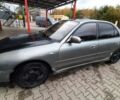 Сірий Міцубісі Галант, об'ємом двигуна 2 л та пробігом 300 тис. км за 1200 $, фото 1 на Automoto.ua
