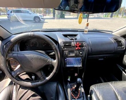 Сірий Міцубісі Галант, об'ємом двигуна 2.4 л та пробігом 319 тис. км за 3500 $, фото 5 на Automoto.ua