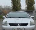 Сірий Міцубісі Галант, об'ємом двигуна 2.4 л та пробігом 220 тис. км за 2999 $, фото 1 на Automoto.ua