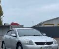 Сірий Міцубісі Галант, об'ємом двигуна 2.4 л та пробігом 220 тис. км за 2999 $, фото 1 на Automoto.ua