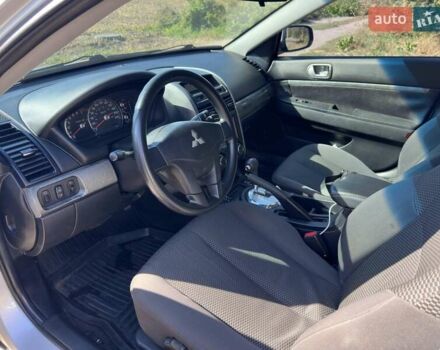 Серый Мицубиси Галант, объемом двигателя 2.38 л и пробегом 274 тыс. км за 5000 $, фото 18 на Automoto.ua