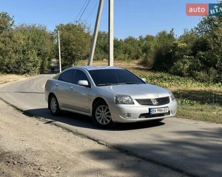 Серый Мицубиси Галант, объемом двигателя 2.38 л и пробегом 274 тыс. км за 5000 $, фото 1 на Automoto.ua