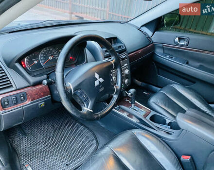 Сірий Міцубісі Галант, об'ємом двигуна 2.38 л та пробігом 217 тис. км за 5400 $, фото 36 на Automoto.ua