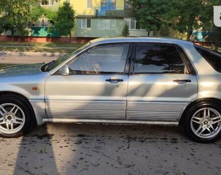 Серый Мицубиси Галант, объемом двигателя 2 л и пробегом 356 тыс. км за 2000 $, фото 1 на Automoto.ua