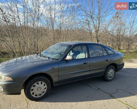 Серый Мицубиси Галант, объемом двигателя 2 л и пробегом 296 тыс. км за 2100 $, фото 1 на Automoto.ua