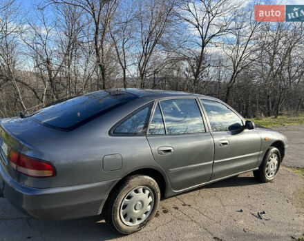 Серый Мицубиси Галант, объемом двигателя 2 л и пробегом 296 тыс. км за 2100 $, фото 2 на Automoto.ua