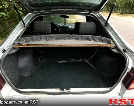 Сірий Міцубісі Галант, об'ємом двигуна 2 л та пробігом 350 тис. км за 2150 $, фото 1 на Automoto.ua