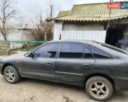 Сірий Міцубісі Галант, об'ємом двигуна 2 л та пробігом 492 тис. км за 1600 $, фото 4 на Automoto.ua