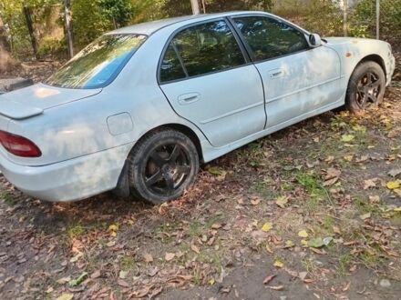 Серый Мицубиси Галант, объемом двигателя 2 л и пробегом 354 тыс. км за 800 $, фото 1 на Automoto.ua