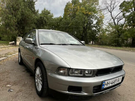 Серый Мицубиси Галант, объемом двигателя 2 л и пробегом 408 тыс. км за 2500 $, фото 1 на Automoto.ua