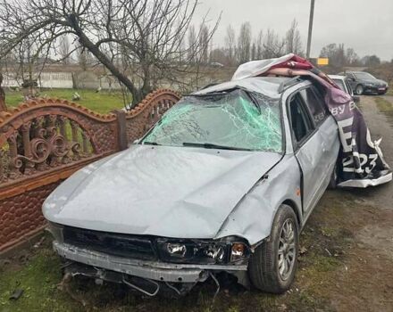 Серый Мицубиси Галант, объемом двигателя 2.5 л и пробегом 400 тыс. км за 500 $, фото 1 на Automoto.ua