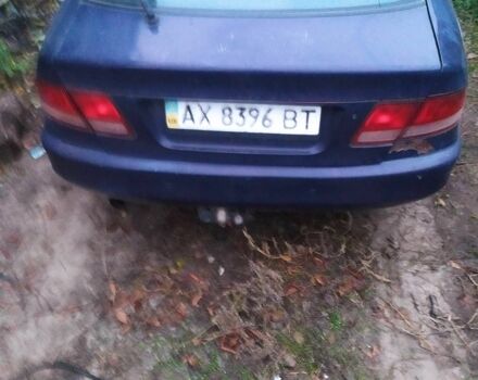 Синий Мицубиси Галант, объемом двигателя 1.8 л и пробегом 300 тыс. км за 1900 $, фото 3 на Automoto.ua