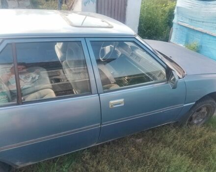 Синий Мицубиси Галант, объемом двигателя 1.8 л и пробегом 550 тыс. км за 600 $, фото 1 на Automoto.ua