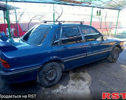 Синий Мицубиси Галант, объемом двигателя 1.8 л и пробегом 128 тыс. км за 1300 $, фото 2 на Automoto.ua