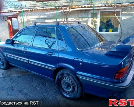 Синий Мицубиси Галант, объемом двигателя 1.8 л и пробегом 128 тыс. км за 1300 $, фото 1 на Automoto.ua