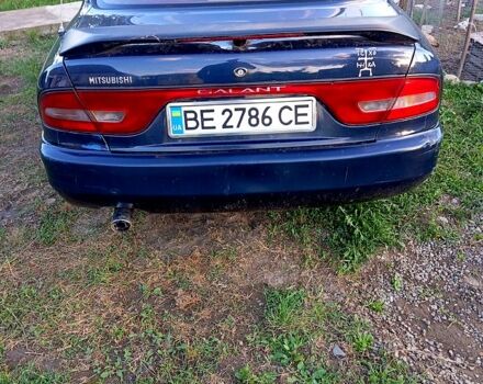 Синий Мицубиси Галант, объемом двигателя 2 л и пробегом 320 тыс. км за 650 $, фото 1 на Automoto.ua