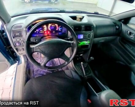 Синий Мицубиси Галант, объемом двигателя 2 л и пробегом 200 тыс. км за 2499 $, фото 5 на Automoto.ua