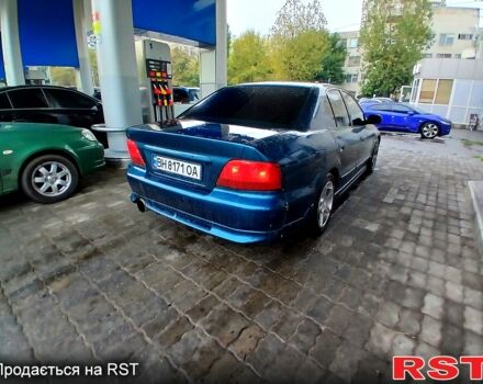 Синий Мицубиси Галант, объемом двигателя 2 л и пробегом 200 тыс. км за 2499 $, фото 4 на Automoto.ua