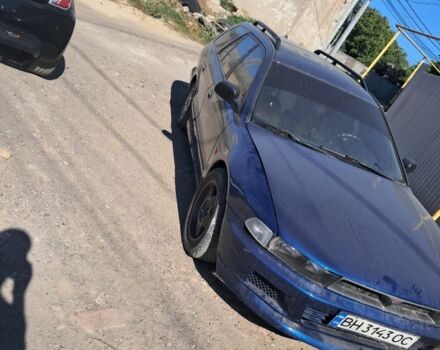 Синий Мицубиси Галант, объемом двигателя 2.5 л и пробегом 2 тыс. км за 1909 $, фото 1 на Automoto.ua