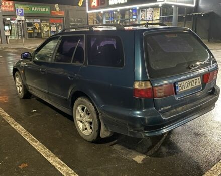 Синий Мицубиси Галант, объемом двигателя 2 л и пробегом 318 тыс. км за 2750 $, фото 3 на Automoto.ua