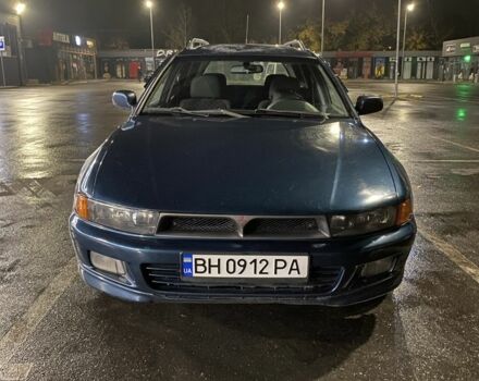 Синий Мицубиси Галант, объемом двигателя 2 л и пробегом 318 тыс. км за 2750 $, фото 1 на Automoto.ua