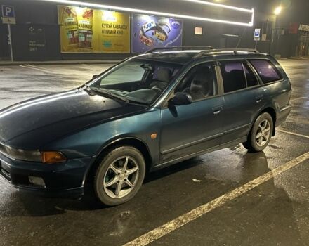 Синий Мицубиси Галант, объемом двигателя 2 л и пробегом 318 тыс. км за 2750 $, фото 2 на Automoto.ua