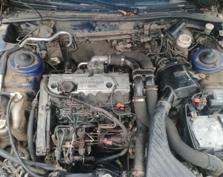 Синий Мицубиси Галант, объемом двигателя 2 л и пробегом 400 тыс. км за 1600 $, фото 1 на Automoto.ua