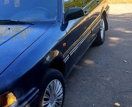 Синий Мицубиси Галант, объемом двигателя 2 л и пробегом 250 тыс. км за 650 $, фото 7 на Automoto.ua