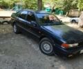 Синий Мицубиси Галант, объемом двигателя 2 л и пробегом 387 тыс. км за 1300 $, фото 1 на Automoto.ua