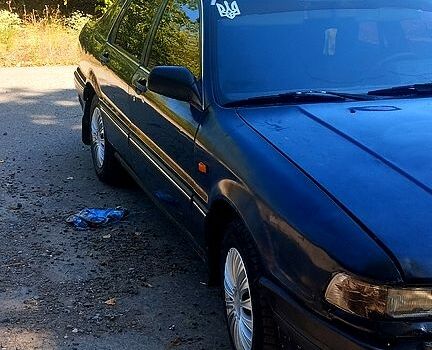 Синий Мицубиси Галант, объемом двигателя 2 л и пробегом 250 тыс. км за 650 $, фото 1 на Automoto.ua