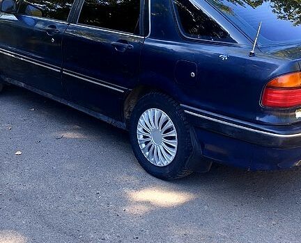 Синий Мицубиси Галант, объемом двигателя 2 л и пробегом 250 тыс. км за 650 $, фото 6 на Automoto.ua