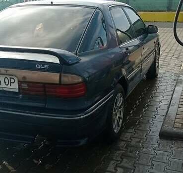 Синий Мицубиси Галант, объемом двигателя 2 л и пробегом 300 тыс. км за 2000 $, фото 1 на Automoto.ua