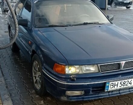 Синий Мицубиси Галант, объемом двигателя 2 л и пробегом 300 тыс. км за 2000 $, фото 1 на Automoto.ua