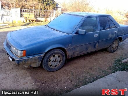 Синий Мицубиси Галант, объемом двигателя 1.8 л и пробегом 200 тыс. км за 600 $, фото 1 на Automoto.ua