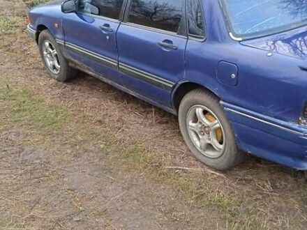 Синий Мицубиси Галант, объемом двигателя 1.8 л и пробегом 500 тыс. км за 1000 $, фото 1 на Automoto.ua