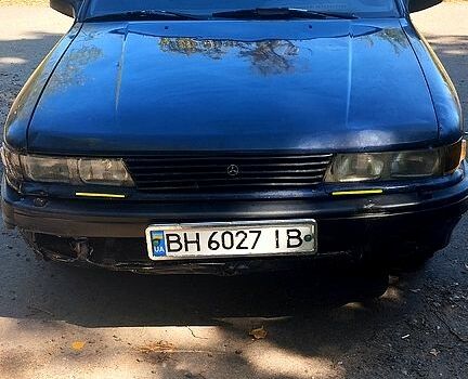 Синий Мицубиси Галант, объемом двигателя 2 л и пробегом 250 тыс. км за 650 $, фото 1 на Automoto.ua