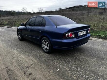 Синий Мицубиси Галант, объемом двигателя 2.5 л и пробегом 264 тыс. км за 3300 $, фото 1 на Automoto.ua