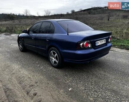 Синий Мицубиси Галант, объемом двигателя 2.5 л и пробегом 264 тыс. км за 3300 $, фото 1 на Automoto.ua