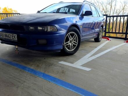 Синий Мицубиси Галант, объемом двигателя 2.5 л и пробегом 200 тыс. км за 4000 $, фото 1 на Automoto.ua