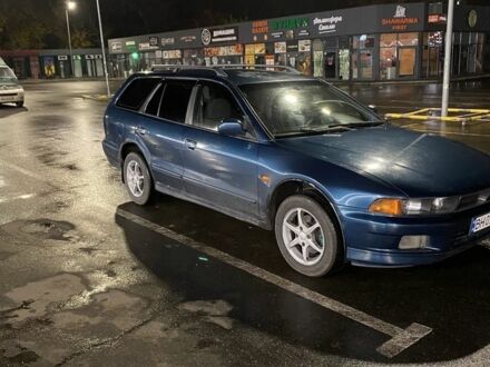 Синий Мицубиси Галант, объемом двигателя 2 л и пробегом 318 тыс. км за 2750 $, фото 1 на Automoto.ua