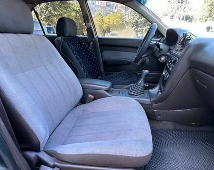 Зеленый Мицубиси Галант, объемом двигателя 1.8 л и пробегом 455 тыс. км за 1999 $, фото 11 на Automoto.ua